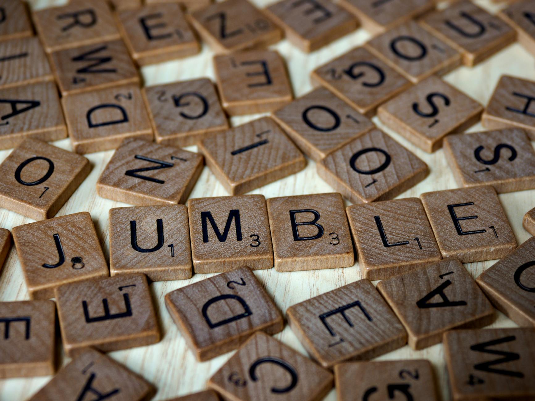 a close up shot of scrabble tiles